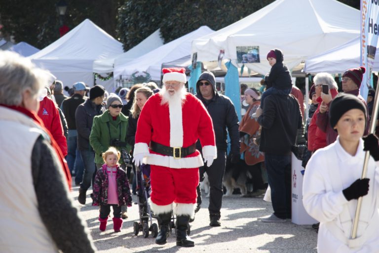 Santa walking through a festival