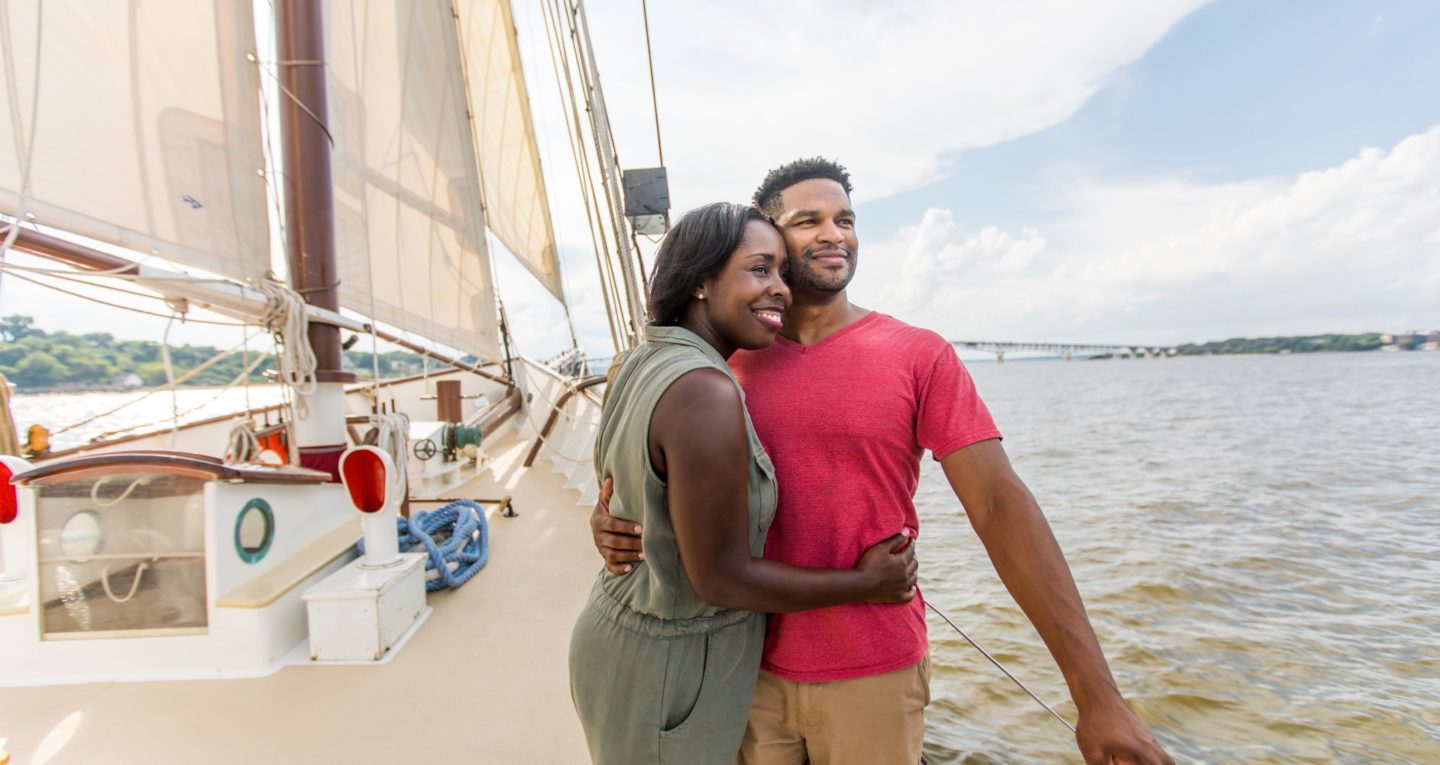 Man and woman hugging on a schooner